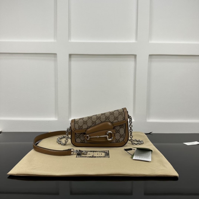 G*u*i top handle bags